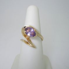 A Beautiful Turn Of Shapes And Colors 14k Solid Gold 1.60 Ct Natural Amethyst Abstract Ring Setting Measures Approx. 19.0 Mm Wide 3.3 Grams Size 7 February Birthstone This Is Nothing Short Of Sensational R205 More Pictures And Info On Goldngals.Com 14k Gold Amethyst Solitaire Ring, Purple Oval 14k Gold Gemstone, Oval Solitaire Amethyst Ring In 14k Gold, 14k Gold Lavender Amethyst Ring, Oval Purple Sapphire Ring In 14k Gold, Solitaire Amethyst Ring In Yellow Gold, Oval Shape, Oval Solitaire Amethyst Ring In Yellow Gold, Yellow Gold 14k Stamped Amethyst Ring, Lavender 14k Gold Jewelry For Formal Occasions