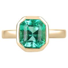 Formal Octagon Emerald Ring With Bezel Setting, 14k Gold Octagon Emerald Ring, Luxury Octagon Emerald Ring With Bezel Setting, 14k Gold Octagon Emerald Ring With Bezel Setting, Luxury Green Emerald Ring With Bezel Setting, Fine Jewelry Octagon Emerald Ring With Bezel Setting, Asscher Cut Solitaire Emerald Ring In Yellow Gold, Octagonal Solitaire Emerald Ring, Green Emerald Ring With Bezel Setting