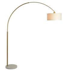 an arc floor lamp with a white shade on the top and a gold metal base