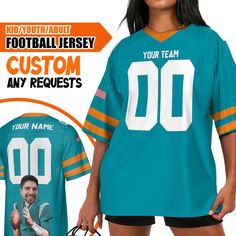 a women's football jersey with an image of a man holding a football and the words custom any name on it