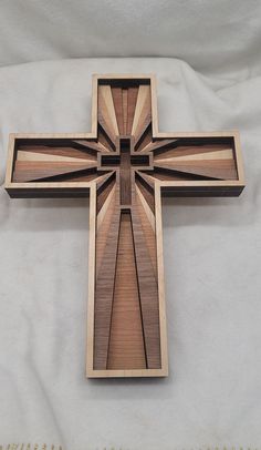 a wooden cross on a white background