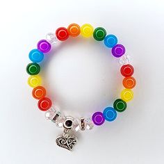 Taste The Rainbow Love Bracelet Handmade By Me Crystal Beaded Stretch Bracelet 7.5" Length Tibetan Silver Heart Charm Rhinestone Accents Simulated Crystal & Gemstone Beads New Ring Not Included Adjustable Rainbow Beaded Bracelets With Heart Beads, Rainbow Heart Beads Bracelet, Adjustable Rainbow Heart Beads Jewelry, Multicolor Heart Charm Bracelets With Round Beads, Multicolor Bracelets With Heart Charm And Round Beads, Multicolor Round Beads Bracelet With Heart Charm, Multicolor Heart-shaped Beaded Bracelets With Heart Charm, Multicolor Heart Charm Bracelet With Round Beads, Multicolor Stretch Bracelet With Heart Beads