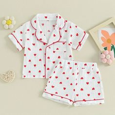 Fall in love with our HEARTS Muslin Pyjamas for baby girls! Featuring a playful hearts pattern, these pyjamas are perfect for Valentine's Day, or keeping cool and comfortable in the summer. Designed for your little sweetheart, these pyjamas are a must-have! White Romper Dress, Ruffle Skirt Outfit, Hoody Outfits, Valentine's Day Kids, Flower Swimsuit, Irish Clothing, Denim Shorts Outfit, Ruffle Outfit