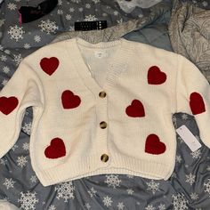 Brand New Tiktok, Famous Viral Heart Cardigan Trendy Heart Print Cardigan For Fall, Cute Heart Graphic Sweater For Winter, Cute Winter Sweater With Heart Graphic, Cute Heart Graphic Sweater For Fall, Trendy Heart Print Sweater For Winter, Trendy Winter Outerwear With Heart Print, Casual Heart Print Cardigan For Spring, Trendy Red Heart Sweater, Winter Heart Graphic Sweater