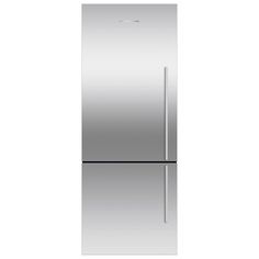 a silver refrigerator freezer sitting on top of a white counter