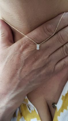 This is a beautiful diamond design pendant with 2 Diamonds. It is set in real solid 14Kt Gold and the chain is 14Kt Gold as well. You can choose if you want 14Kt White Gold, 14Kt Yellow Gold or 14Kt Rose Gold. This is the perfect gift for mom, wife, fiancee, girlfriend, valentine, daughter, family or friend. It is a special gift for mother's day, valentine's day, wedding, anniversary, birthday, Christmas, Easter, New Year's and any holiday. Each diamond is 0.15 Carats Total is 0.30 Carats Color: Gold Solitaire Necklace With Lab Grown Diamond For Anniversary, Gold Solitaire Necklace With Lab Grown Diamond For Wedding, Yellow Gold Diamond Solitaire Necklace For Anniversary, Gold Solitaire Necklace With Prong Set Lab Grown Diamond, Gold Solitaire Necklace With Prong Setting, Gold Lab Grown Diamond Necklace For Wedding, 14k Gold Solitaire Necklace With Vvs Clarity For Anniversary, Gold Solitaire Necklace With Lab Grown Diamond For Gift, Gold Diamond Solitaire Necklace For Anniversary