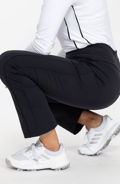 Lightweight, UPF-protective Italian fabric brings moisture-wicking comfort to stretchy, ankle-cropped golf pants featuring a smoothing wide waistband. 26" inseam; 14 1/2" leg opening; 9 1/2" front rise; 12" back rise   UPF 50+ sun protection   Moisture-wicking fabric engineered for dryness and comfort   Antimicrobial fabric engineered to inhibit the growth of odor-causing germs   65% recycled nylon, 35% Lycra® spandex   Dry clean or machine wash, tumble dry   Imported Sporty Mid-rise 4-way Stretch Pants, Sporty Mid-rise Pants With 4-way Stretch, Sporty 4-way Stretch Ankle-length Activewear Pants, Sporty Ankle-length Pants With 4-way Stretch, 4-way Stretch Straight Leg Activewear For Sports, Moisture-wicking Straight Leg Bottoms With 4-way Stretch, Mid-rise Moisture-wicking 4-way Stretch Bottoms, Moisture-wicking 4-way Stretch Straight Leg Bottoms, Black 4-way Stretch Go-dry Pants