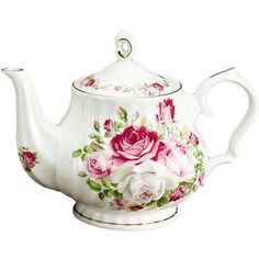 a tea pot with roses painted on it