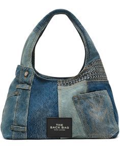 blue cotton denim patchwork design two top handles appliqué logo open top main compartment removable pouch internal zip-fastening pocket silver-tone hardware Blue Cotton Shoulder Bag, Blue Cotton Bag With Zipper Closure, Blue Cotton Bag With Zipper Pocket, Blue Cotton Bags With Zipper Pocket, Blue Denim Shoulder Bag With Handles, Blue Cotton Bag, Trendy Blue Patchwork Bags, Blue Recycled Denim Bags, Trendy Blue Recycled Denim Shoulder Bag