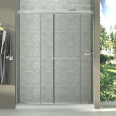 a walk in shower sitting next to a sliding glass door with an open side panel