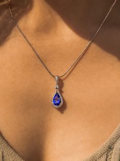 A rare gem, only found in Tanzania, this one specifically is a stunner that even colectors would covet. 14k White Gold, 18" Serpentine Chain 1.84ct AAA Natural Tanzanite pear shape .21ct VS Natural Diamond Fine Jewelry Sapphire Drop Necklace, Luxury Sapphire Drop Jewelry, Exquisite Blue Teardrop Jewelry, Luxury Pear-shaped Sapphire Jewelry, Dazzling Pear-shaped Jewelry For Gift, Luxury Pear-shaped Gemstone Accented Jewelry, Luxury Pear-shaped Jewelry With Gemstone Accents, Teardrop Sapphire Necklace In Fine Jewelry Style, Luxury Tanzanite Pear-shaped Jewelry