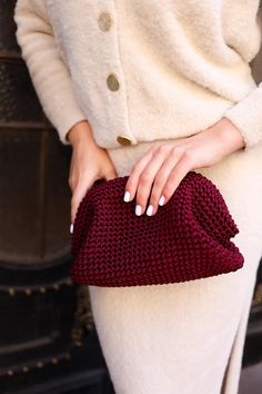 Elevate your style with this handmade burgundy crochet bag, a perfect blend of fashion and sustainability. Crafted from cord, this boho-chic clutch is both durable and stylish, making it the ideal accessory for any occasion--from casual day outings to elegant evening events. The deep burgundy color is a must-have for this season, offering a rich, warm tone that complements any wardrobe. The bag features a sleek chain strap, adding a touch of sophistication to the relaxed, handmade vibe. Height: 19 cm  Width: 26 cm  Strap Length: 112 or 120 cm Care Instructions: Spot clean or dry clean only to ensure it remains as vibrant as the day you bought it. Burgundy Clutch, Burgundy Purse, Boho Clutch, Burgundy Bag, Women's Bags By Shape, Crochet Clutch, Sling Bags, Handbag Women, Fall Accessories