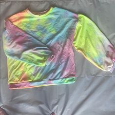 Long Sleeve Tie Dye Top, Runs Small Green Color Block Top For Loungewear, Blue Tops With Rainbow Print For Spring, Blue Top With Rainbow Print For Spring, Casual Blue Tops With Rainbow Print, Casual Green Tops With Rainbow Print, Rainbow Color Block Tops For Spring, Spring Rainbow Color Block Tops, Trendy Yellow Color Block Tops, Cute Multicolor Tops For Loungewear