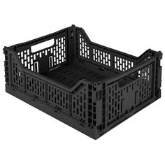 an empty black plastic crate on a white background