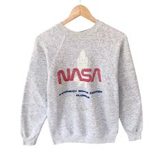 Vintage 90s Nasa Kennedy Space Center Florida Grey Size Small Nasa Crewneck Nasa Kennedy Sweater Pullover Spell Out Print Logo Nasa Jumper by brixtonclothing on Etsy Vintage Sweater With Letter Print And Long Sleeves, Vintage Fall Sweater With Letter Print, Vintage Long Sleeve Sweater With Letter Print, Vintage Letter Print Sweater For Fall, Vintage Letter Print Winter Sweater, Vintage Letter Print Sweater For Winter, Vintage Crew Neck Winter Top, Vintage Crew Top For Winter, Vintage Winter Crew Neck Top