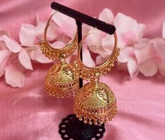 Light weight jhumka hoop earrings in bright gold finish 2.5 inch length x 1 inch wide for bell  Ready to ship! Chandbali Hoop Earrings With Latkans, Chandbali Earrings With Bells For Festivals, Heavy Gold Chandbalis, Traditional Gold Hoop Earrings For Party, Hoop Jhumkas For Festivals, Heavy Temple Jewelry Hoop Earrings, Temple Jewelry Hoop Earrings For Festivals, Bollywood Style Hoop Earrings For Celebrations, Gold Hoop Jhumkas Temple Jewelry