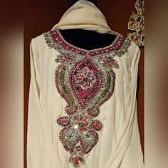 New White-Silver Anarkali W/ Chudidaar Pants And Chiffon Dupatta From Sahil's Exclusive. Shirt Dimensions: (See Picture For Reference On How The Shirt Was Measured) 1. Bust - 21in (42in Around) 2. Waist - 19.5in (39in Around) 3. Hips - 20in (40in Around) 4. Sleeve Length - 22.5in 5. Arm Hole - 8in (16in Around) 6. End Of Sleeve - 4.5in 7. Shoulders - 30in 8. Total Shirt Length - 48in Pant Dimensions: 1. Inner Length - 15in 2. End Of Pant Width - 5.5in 3. Total Pant Length - 49in Dupatta Has Silv Pakistani Anarkali Suits, Pakistani Anarkali, Indian Salwar Suit, Gown With Dupatta, Pakistani Salwar Kameez, Punjabi Salwar Suits, Silver Lace, Sheer Shirt, Chiffon Dupatta