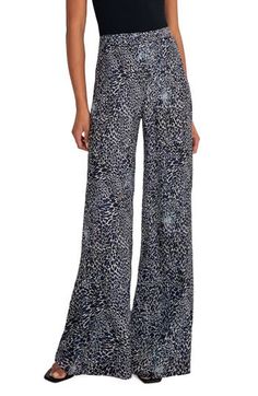 Party like it's a three-day weekend in these high-rise, full-length wide-leg pants made from lightweight woven fabric with a wild cheetah print. 32 1/2" inseam; 25" leg opening; 14 1/2" front rise; 17 1/2" back rise (size 8) 100% polyester Machine wash, tumble dry Made in Turkey Leopard Print Wide Leg Bottoms With Relaxed Fit, Chic Leopard Print Straight Leg Bottoms, Leopard Print Wide Leg Bottoms For Work, Wide Leg Leopard Print Bottoms For Work, Workwear Wide Leg Leopard Print Bottoms, Elegant Leopard Print Summer Bottoms, Leopard Print Wide Leg Loungewear Pants, Chic Leopard Print Summer Pants, Chic Leopard Print Bottoms For Spring