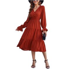 Design Feature: The 2024 smocked waist maxi dress makes you look more noticeable. The graceful casual flowy ruffle dress for women design with pull on closure, wrap v-neck, smocking elastic high waist, long lantern sleeves, tiered swing dress, a line pleated flowy hem. A-line and high waist design is easy to show your sexy curve, and the flare tiered swing skirt making you comfortable all the day, can perfectly express your personality and chic. Also can be wear as a maternity dress. Flowy Ruffle Dress, Flowy Long Dress, Stylish Maternity Dress, Skirt Making, Midi Dress Long Sleeve, Flowy Dress Long, Orange Caramel, Boho Midi Dress, Women Design