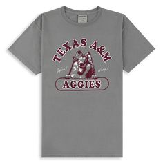 Show off your Texas A&M spirit with this stylish and comfortable t-shirt! Featuring the official mascot of the Aggies, Reveille, smiling away with "Texas A&M Aggies" in maroon, this gray t-shirt is perfect for showing your school pride! - Brand: Comfort Wash - 100% Cotton - Machine Wash Cold/Tumble Dry Low School Pride, Texas A&m, Gray Tshirt, Texas, Size Medium, Sports, T Shirt