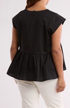 A peplum silhouette brings playful movement to this cotton poplin top that can be easily dressed up or down. 26" length (size 1X) Split neck Short sleeves 95% cotton, 3% spandex Machine wash, line dry Made in the USA Chic Poplin Top With Relaxed Fit, Fitted Cotton Peplum Top With Ruffle Hem, Spring Poplin Tops With Relaxed Fit, Cotton Ruffle Peplum Top, Chic Cotton Peplum Top With Ruffle Hem, Cotton Peplum Tops, Cotton Peplum Top With Ruffles, Cotton Tops With Ruffle Hem, Summer Cotton Peplum Top