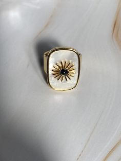 Brand new  💕Handcrafted  ✨Due to the one-of-a-kind nature of natural stone pieces, exact colour and stone patterns may vary slightly Beautiful high quality that is nickel and lead free. Ring is 18K gold plated and tarnish resistant COLOURGold  SIZEApprox 2.2 cm L x 1.6 cm W Size 7, Inner Diameter: 17mm Material18K Plated Gold Brass White Mother of Pearl with Onyx sun centre Weight9.7g 💌 Price includes free TRACKED shipping within Australia + free cardboard ring box and limited edition My Rose Elegant Rectangular Rings With Natural Stones, Elegant Rectangular Natural Stone Rings, Minimalist Rectangular Onyx Jewelry, Black Rectangular Spiritual Jewelry, Rectangular Onyx Gemstone Jewelry, Handmade Yellow Gold Rectangular Jewelry, Handmade Rectangular Yellow Gold Jewelry, Luxury Rectangular Onyx Jewelry, Rectangular Onyx Gemstone Rings