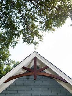 the top of a building with a cross on it