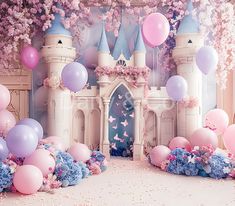 an image of a castle with balloons and flowers