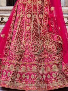 If you dream of a truly traditional yet stylish wedding look, we have the perfect outfit for you - the regal pink bridal lehenga choli. This exquisite ensemble, crafted from a heavy velvet fabric, truly brings out the richness and opulence of traditional attire.
What sets this bridal lehenga choli apart is its intricate embroidery and fancy dori work, beautifully complemented with dazzling zarkan stone work. Every detail on this outfit has been meticulously designed to create a stunning look tha Diwali Velvet Unstitched Lehenga, Unstitched Velvet Lehenga For Diwali, Festive Velvet Lehenga With Pallu, Festive Semi-stitched Velvet Lehenga, Festive Velvet Semi-stitched Lehenga, Festive Velvet Lehenga With Dori Work, Traditional Pink Lehenga With Intricate Embroidery, Pink Semi-stitched Sharara With Meenakari, Velvet Traditional Wear With Pallu For Wedding