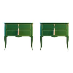 pair of green nightstands with tasseled handles and gold trim on each drawer