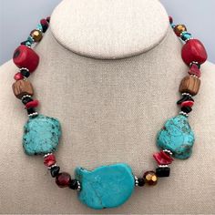 Southwestern Faux Turquoise Faux Bamboo Coral Stone Chip Collar Necklace 17” Genuine Stone Faux Turquoise Stone Slices Are Strung With Red Bamboo Coral, Brown Wood Beads, Red Faceted Glass Beads And Red, Blue And Black Stone Chip. Lobster Clasp. Unsigned. Length Is 17” With An Additional 4” Extender. Nwot. New Without Tags. Bundle To Save. I Offer A Discount On Bundles With Discounted Or Free Shipping. Offers And Counteroffers Are Always Welcome! Fast Shipper, Smoke-Free, Kitty Friendly Home. I Turquoise Coral Jewelry, Red Bamboo, Bamboo Coral, Stone Chips, Coral Stone, Coral Jewelry, Faux Bamboo, Coral Turquoise, Women Artisans