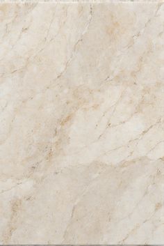 a white marble textured tile background or wallpaper with light brown and beige colors