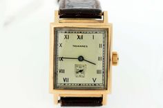 This Tavannes 14K Gold Wrist Watch has a seconds dial and is rectangular in shape for the watch case.This watch is rose gold, has a domed crystal, roman numerals, and comes with a genuine leather strap 16L Italy that is brown. This watch measures 22.87mm wide, 34.83mm tall and weighs 0.89oz.This watch is in working condition and comes with a 1 year guarantee. --Please reference our policy for more details-- International wrist watch orders will have their leather strap removed from the timepiece Timeless Rectangular Chronometer Watch, Classic Rectangular Watches With Date Display, Timeless Rectangular Watch With Date Display, Elegant Rectangular Watch Accessories With Date Display, Timeless Rectangular Rose Gold Watch Accessories, Timeless Rose Gold Rectangular Watch Accessories, Antique Rectangular Watches For Anniversary, Rectangular Watches With Date Display, Rectangular Watches With Date Display For Anniversary