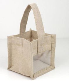 a bag that is made out of jute and has a handle on the inside