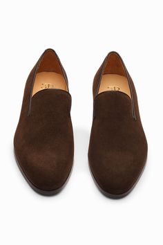 Brown penny loafers features hand built Argentinean leather sole, dark brown suede calf-skin leather uppers and rich tan cow leather lining.
Composition: Leather
Color: Brown
Other Details: 
Weight (in kg) : 1
Heel height (in inch): 1 - Aza Fashions Formal Brown Slip-ons With Suede Lining, Semi-formal Brown Moccasins, Elegant Brown Loafers With Goodyear Welt Construction, Elegant Brown Loafers With Goodyear Welt, Luxury Brown Plain Toe Slip-ons, Brown Leather Shoes With Suede Lining For Semi-formal Occasions, Brown Leather Shoes With Suede Lining For Business Casual, Semi-formal Brown Leather Shoes With Suede Lining, Masculine Brown Suede Dress Shoes