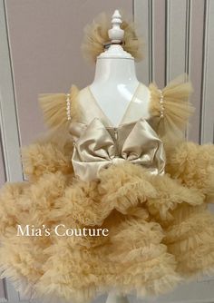 Elegant Embellished Tutu Dress For Dress-up, Elegant Gold Gown For Dress-up, Gold Embellished Tulle Dress, Glamorous Gold Tulle Dresses, Gold Gown With Fitted Bodice For Pageant, Elegant Gold Princess Dress With Ruffles, Gold Embellished Princess Dress, Gold Fitted Pageant Dress For Party, Gold Fitted Pageant Party Dress