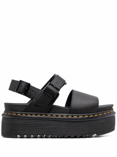 Black leather platform-sole sandals from DR. MARTENS featuring platform sole, buckle-fastening ankle strap, open toe and branded insole. | Dr. Martens Platform-Sole Sandals Doc Sandals, Doc Marten Platform, Platform Dr Martens, Dr Martens Voss, Dr Martens Sandals, Dr Martens Platform, Nike Shoes Women Fashion, Leather Flip Flops, Embellished Sandals