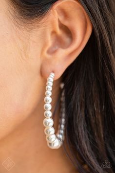 Gradually increasing in size at the center, a classy row of white pearls are threaded along an oversized hoop for a posh finish. Earring attaches to a standard post fitting. Hoop measures approximately 2 1/4" in diameter. Sold as one pair of hoop earrings. P5HO-WTXX-090BN FASHION FIX AUGUST 2021 Paparazzi Fashion, Pink Jewels, Streets Of New York, 5th Avenue, 2021 Fashion, Pearl Hoop Earrings, Paparazzi Accessories, Rings For Girls, White Rhinestone