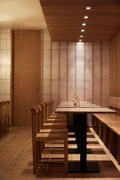 a long table and benches in a room