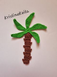 a crocheted palm tree with the words kristenketta on it