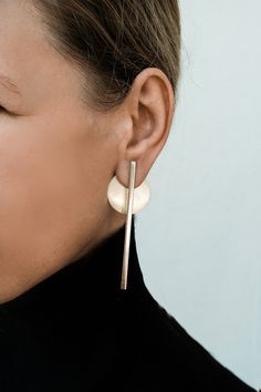 "Long Sterling silver ear jacket gold line earrings, Front back earring jacket, Modern statement earrings, Double earrings, Bar ear jacket Earrings are available in brass and silver, or both (brass bars + silver circles). For brass go to: https://www.etsy.com/uk/shop/MoonkidJewelry?ref=seller-platform-mcnav&section_id=25817872 These modular earrings with sterling silver posts and backs are polished to give them a soft matte texture. Each earring consists of 2 parts that can be detached from each Line Earrings, Extra Long Earrings, Gold Ear Jacket, Jacket Earrings, Double Earrings, Double Sided Earrings, Large Statement Earrings, Earrings Double, Front Back Earrings