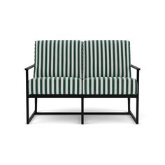 a green and white striped couch with black frame