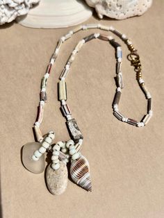 Necklace 18 inches/ Rare White Afghani Ancient Roman Glass Tube Beads /natural shell charm/ stone charm/ boho Ancient Roman Glass, Roman Glass, Ancient Romans, Tube Beads, Natural Beads, Pendant Necklaces, Jewelry Necklace Pendant, Shells, Jewelry Necklaces