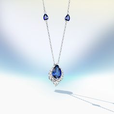 Introducing the captivating "ENDLESS BLUE" 5.41 Ctw. Pear Shaped Sapphire Necklace, a symbol of timeless elegance and environmental responsibility. This exquisite necklace is available in various options: S925 Silver, 10K Gold, 14K Gold, 18K Gold, and Platinum, allowing you to find the perfect match for your style and preference.At the heart of this necklace shines a brilliant lab-grown pear-shaped sapphire, reminiscent of the endless depths of the ocean. Surrounding the sapphire are glistening Elegant Sapphire Pear-shaped Necklace, Luxury Blue Teardrop Pendant Necklace, Elegant Pear-shaped Sapphire Necklace, Luxury Blue Pear-shaped Necklace, White Gold Sapphire Pear-shaped Necklace, Pear-shaped Sapphire Necklace In White Gold, Formal Sapphire Pear-shaped Necklaces, Blue Pear-shaped Sapphire Necklace, Formal Pear-shaped Sapphire Necklace