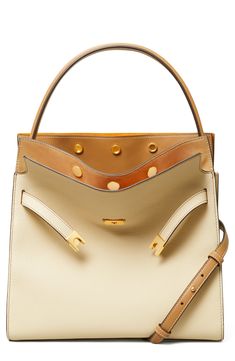 Inspired by and named for late style icon Lee Radziwill, this satchel is a study of contrasts with its mixed leather and soft, yet structured shape. Its multicompartment design can be snapped in different ways or left open, which is meant to conceptually mimic an unfolding outerwear collar. Structured silhouette with flat base for stability Cotton lining Leather Imported Designer Tan Satchel With Removable Pouch, High-end Tan Satchel, High-end Beige Bag With Leather Lining, High-end Beige Calf Leather Bag, Designer Cream Bag With Leather Lining, Timeless Cream Bag With Leather Lining, Cream Calf Leather Bag With Gold-tone Hardware, Cream Calf Leather Bag With Leather Lining, Designer Beige Calf Leather Bag