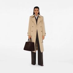 Long Waterloo Heritage Trench Coat in Honey - Women | Burberry® Official Classic Long Raincoat For Fall, Classic Beige Raincoat For Fall, Classic Fall Raincoat For Work, Classic Long Single Breasted Raincoat, Classic Fall Workwear Raincoat, Classic Long Single-breasted Raincoat, Classic Gabardine Outerwear For Daywear, Classic Long Sleeve Raincoat For Work, Classic Long Gabardine Raincoat