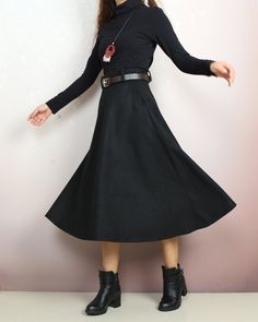 * A midi wool skirt, worked out a comfortable and flattering long skirt for daily wear. * Accurate and smart cut to visually slim and let your legs look longer and slender. * Made of quality wool faric, with fully lined, comfortable and warm. * Materials: 30% wool, 20% cotton, 50% polyseter Shop sizing chart FYI ( actual body figures, not laying flat clothes measurements) Size XS (US 2, UK 6, German 32, French 34) Bust: fits bust around 33.5 inches/85cm Waist: fits waist around 26 inches/66cm Hi Winter Workwear Fitted Maxi Skirt, Black Long Winter Skirt, Black Long Skirt For Winter, Black Winter Workwear Pencil Skirt, Black Winter Pencil Skirt For Workwear, Black Flared Winter Skirt, Black Winter Pencil Skirt For Work, Black Flared Skirt For Winter, Knee-length Maxi Skirt For Workwear In Fall