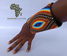 Our Hand Bracelet is a stunning work of art, hand-stitched from fine leather and adorned with exquisite bead art decoration. It's durable, adjustable, and versatile, making it the perfect accessory for any occasion. A symbol of beauty and elegance, it's sure to enhance any outfit and turn heads wherever you go. Don't settle for a boring bracelet - choose the Hand Bracelet and make a bold statement with your fashion choices. Order now and experience the ultimate expression of style, elegance, and individuality. Multicolor Leather Bracelets, Adjustable Beaded Wristband For Festival, Artisan Hand-stitched Adjustable Jewelry, Handmade Leather Beaded Bracelets For Festivals, Adjustable Multicolor Leather Bracelet With Colorful Beads, Handmade Leather Beaded Bracelets, Adjustable Beaded Leather Bracelet Gift, Artisan Adjustable Beaded Bracelets, Festival Beaded Adjustable Wristlet