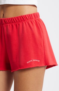 These extrasoft French-terry shorts are made of a cotton blend and topped with a stretchy elastic waist. 2 1/2" inseam; 28" leg opening; 10" front rise; 15" back rise (size Medium) Elastic waist 60% cotton, 40% polyester Machine wash, tumble dry Imported Cotton Athleisure Athletic Shorts For Beach, Relaxed Fit Cotton Athletic Shorts For Beach, Sporty Cotton Athletic Shorts For Vacation, Sporty Cotton Athletic Shorts For Beach, Solid Cotton Shorts With Ribbed Waistband, Cotton Athletic Shorts For Beach With Short Legs, Red Cotton Sporty Athletic Shorts, Sporty Cotton Pajama Shorts For Vacation, Sporty Cotton Shorts For Vacation