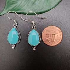 Visit our on-line shop at: Etsy.com/shop/AlbuquerqueDesigns *sterling silver earrings *dangles / drops *southwestern jewelry *kingman turquoise *calibrated pre-cut stones: 15x10mm teardrop shape *all jewelry items are made to ship, slight variations in stones will occur comparing to pictures *size of a penny is 19mm or a dime is 18mm in diameter for comparing size with jewelry items *handcrafted in USA *free convenient gift box *free shipping in US, ship from US without insurance *seller provide Turquoise Heart Earrings, Turquoise Dangle Earrings, Turquoise Drop Earrings, Turquoise Earrings Dangle, Turquoise Heart, Earrings Turquoise, Southwestern Jewelry, Kingman Turquoise, Stunning Earrings